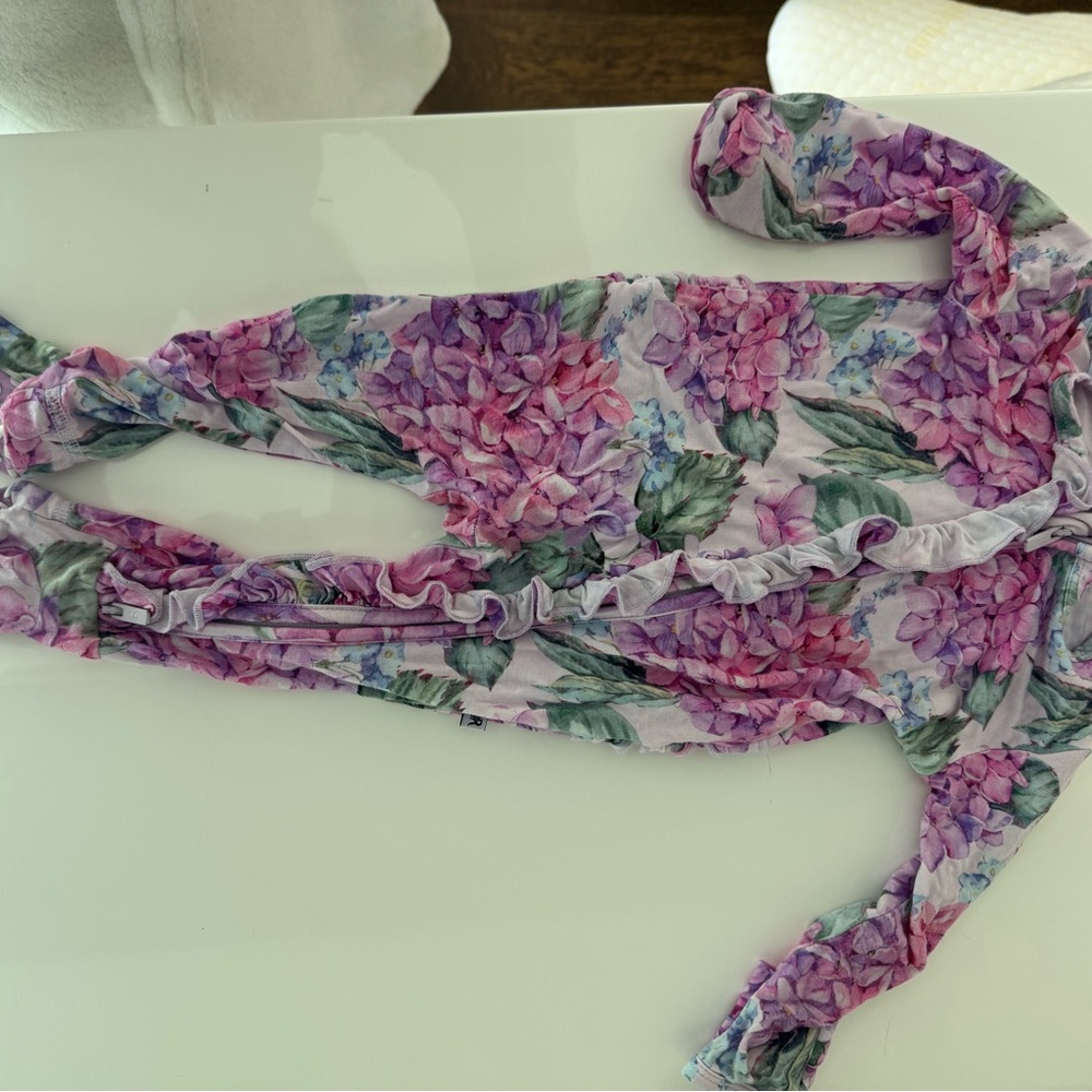 Floral baby onesie 
Posh peanut 
3-6 months size